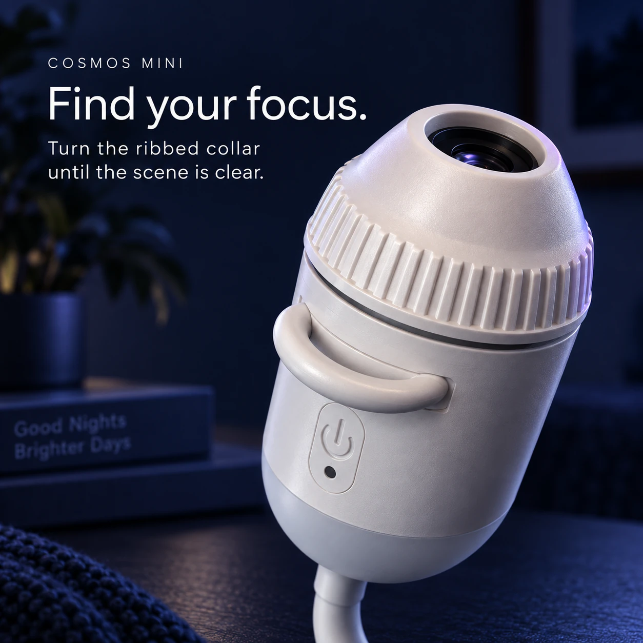 Close-up of the COSMOS Mini ribbed manual focus collar and recessed lens