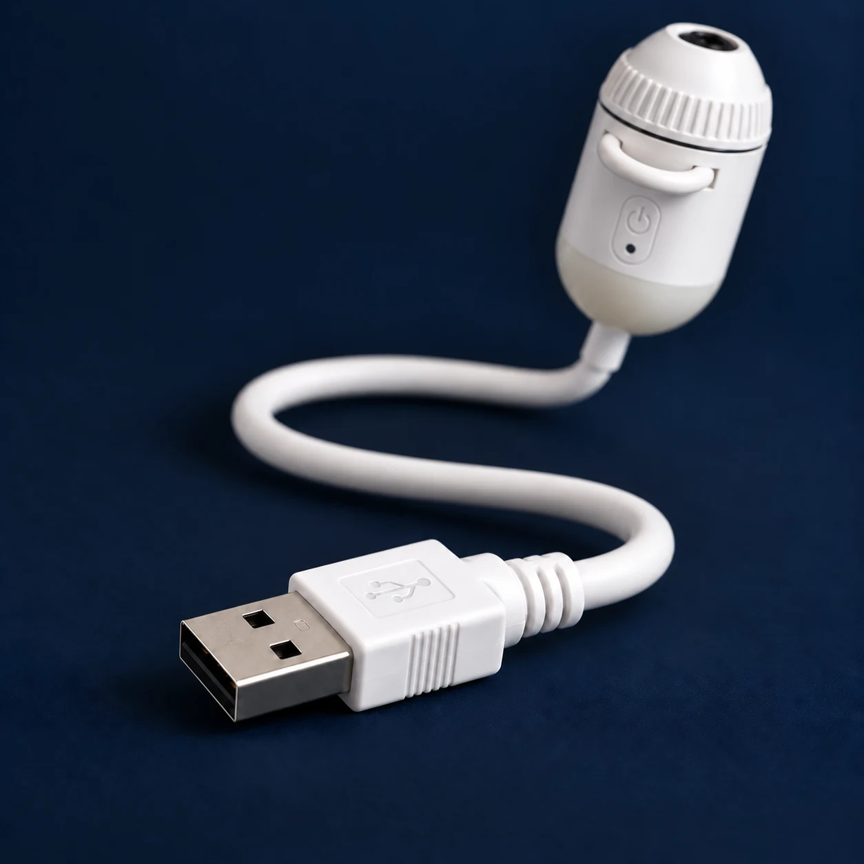 USB-A power connector on the flexible white neck of the compact projector